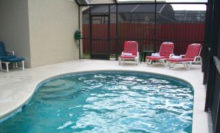 Sun loungers in pool area